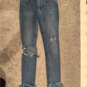 Distressed Blue Jeans